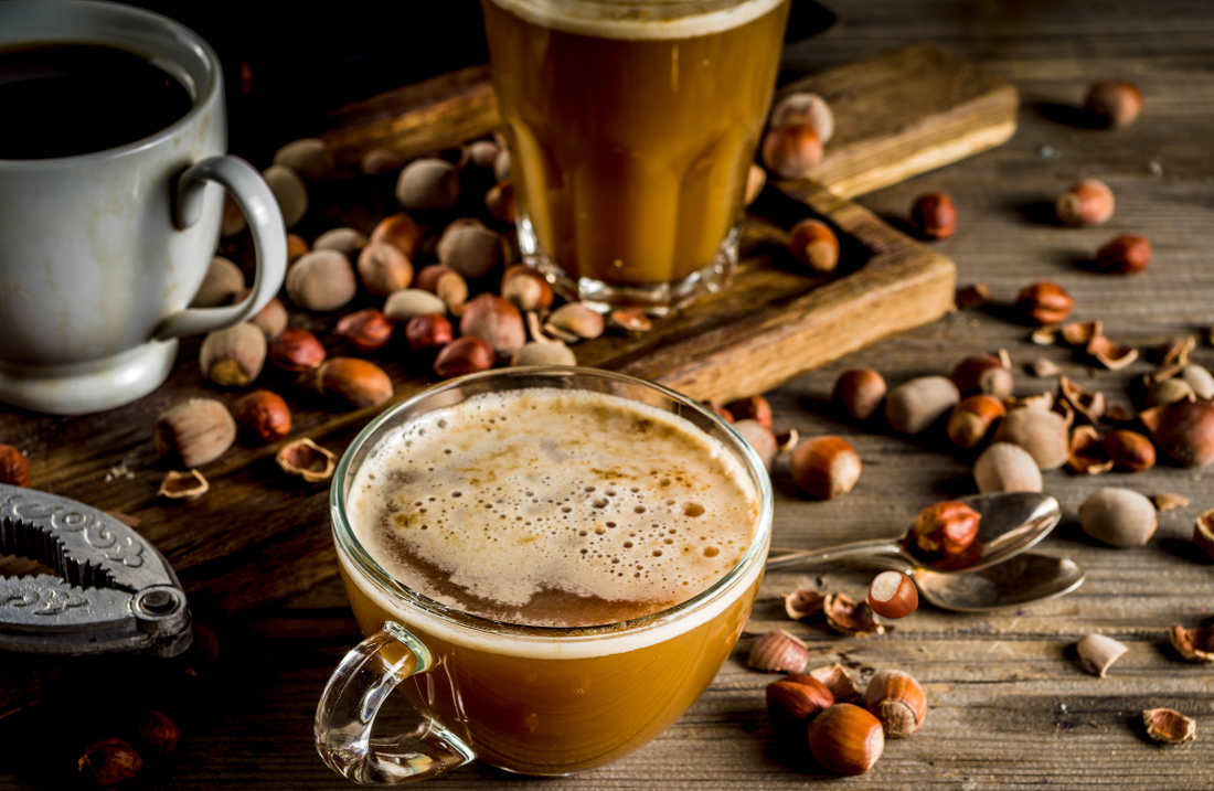 Hazelnut Esposa coffee cup on a wooden table, capturing the essence of love and flavor in every sip